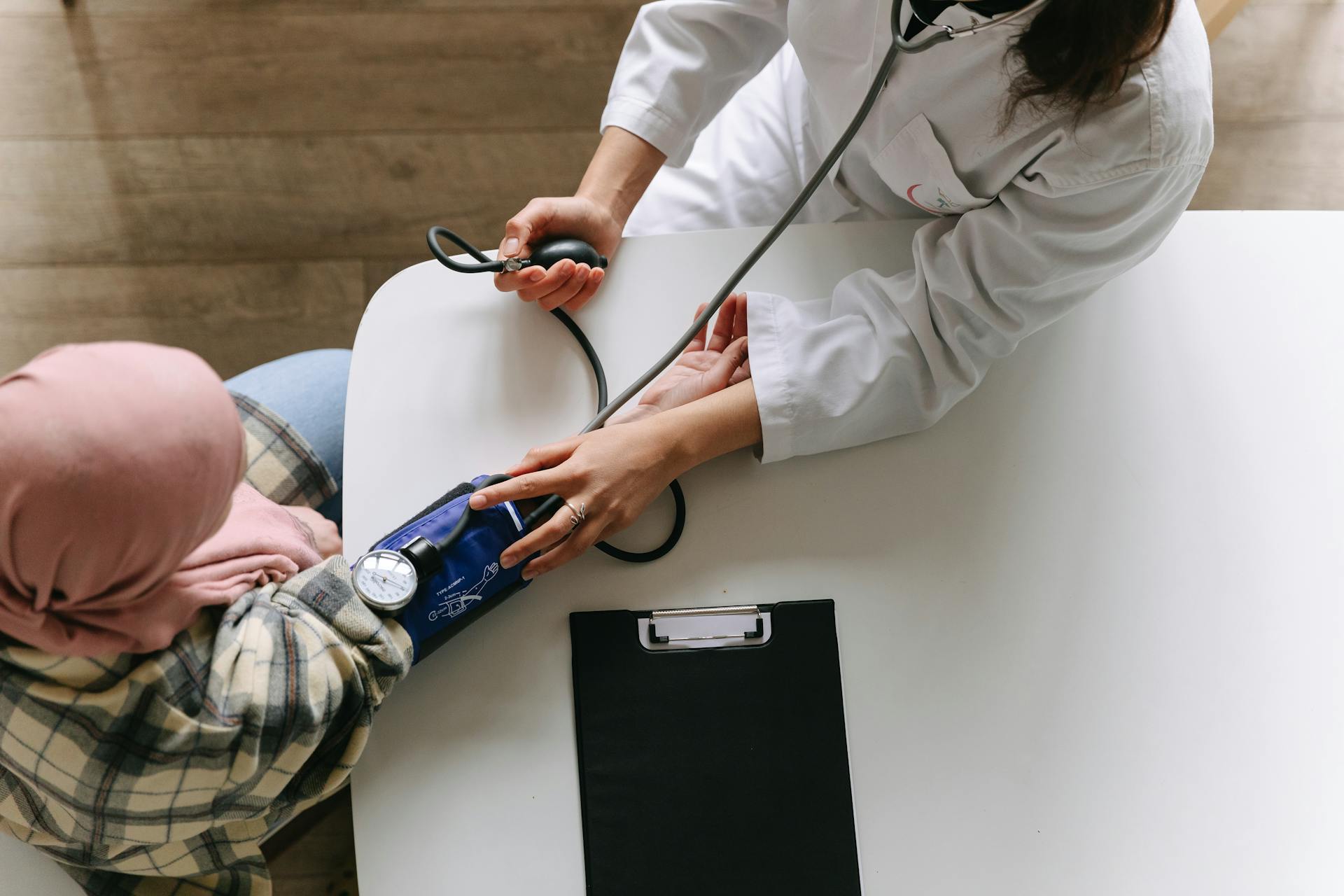 photo of doctor assessing patient